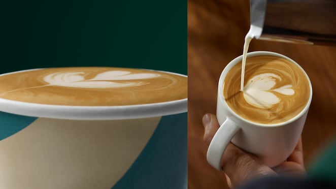 Barista, ki naliva mleko v Shell Cafe belo keramično skodelico