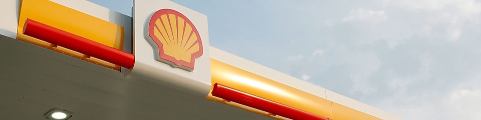 Logotip družbe Shell z nebom in oblaki