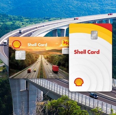 Dve Shell kartici sta prikazani pred viaduktom, po katerem vozijo osebna in tovorna vozila.