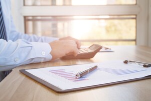 Businessman in the office work, finance, data, working from home, finance, charts, graphs, values, spend, savings, accounting, budget