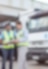 Workers loading a lorry
