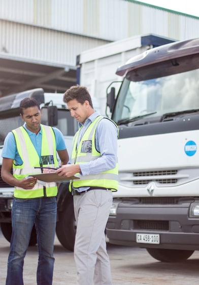 Workers loading a lorry