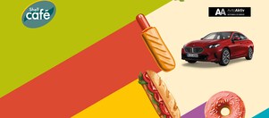 Promocijska slika Festivala hrane z rdečim BMW avtomobilom in Shell Café dobrotami.